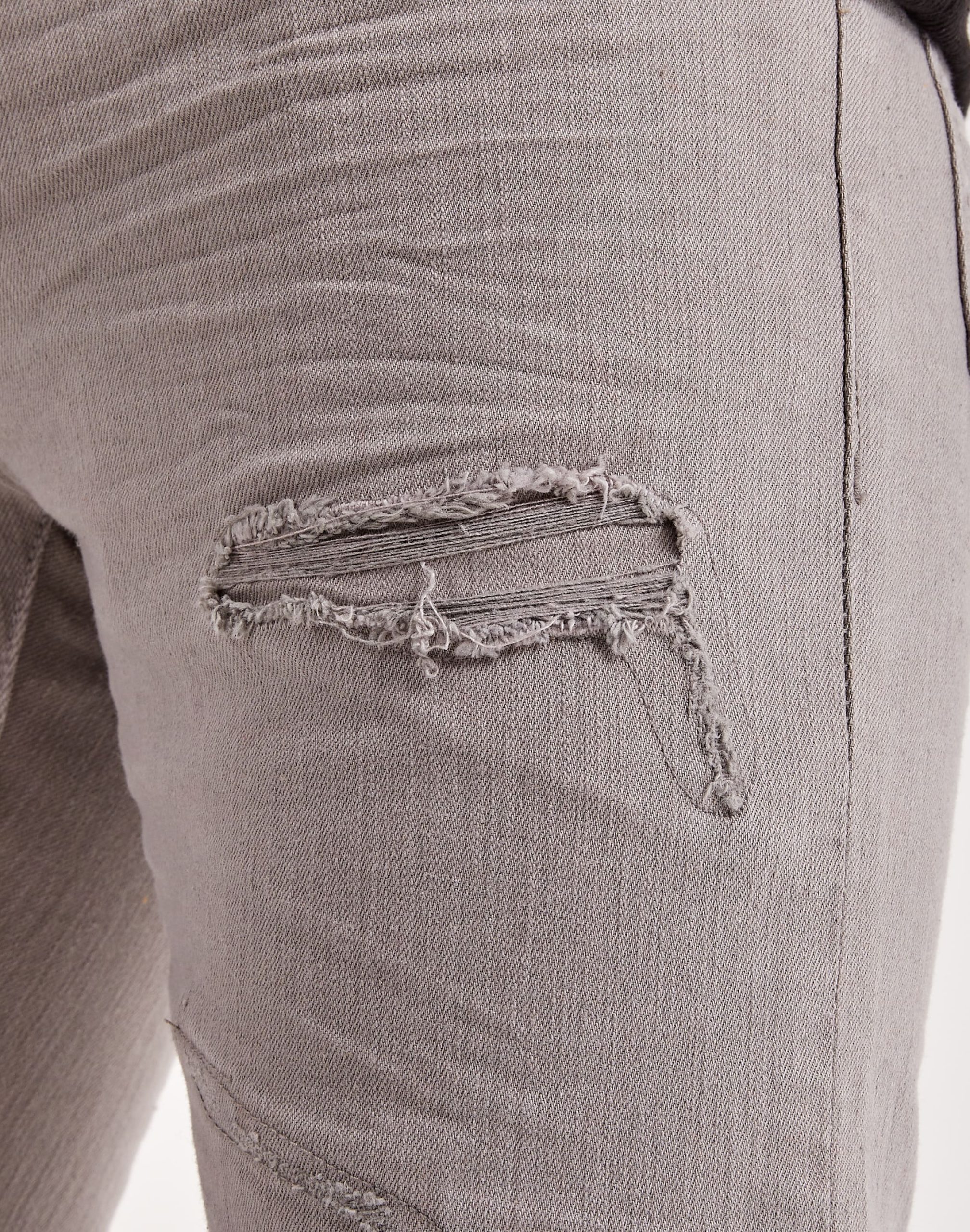 Jordan Craig Stacked Distressed Denim Jeans - Image 4