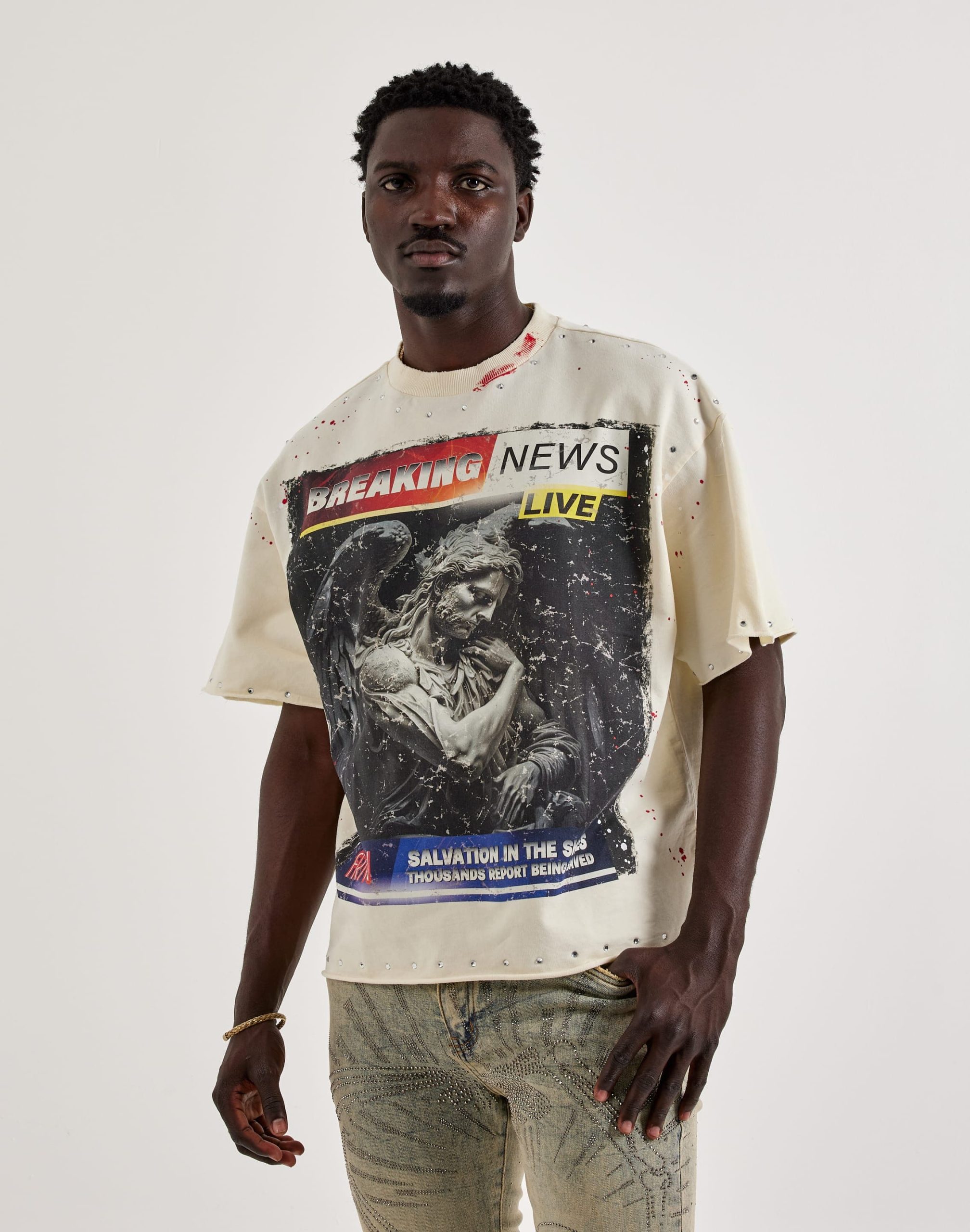 First Row Breaking News Rhinestone Tee
